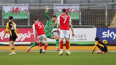 131225 - Newport County v Fleetwood Town, EFL Sky Bet League 2 - Finley Potter of Fleetwood Town heads past Jordan Wright of Newport County to score the opening goal