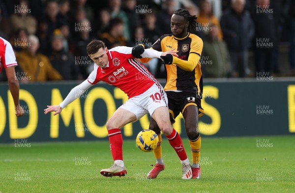 131225 - Newport County v Fleetwood Town, EFL Sky Bet League 2 - Mark Helm of Fleetwood Town and Cameron Antwi of Newport County compete for the ball