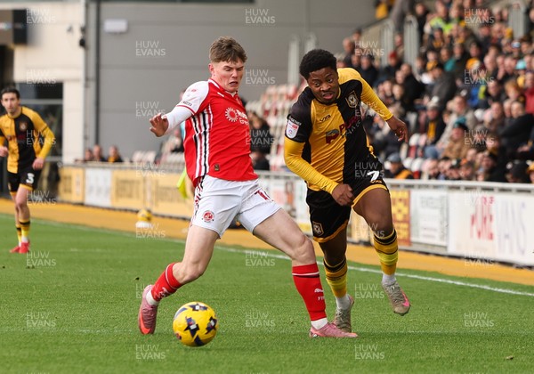 131225 - Newport County v Fleetwood Town, EFL Sky Bet League 2 - Bobby Kamwa of Newport County gets away from Ethan Ennis of Fleetwood Town