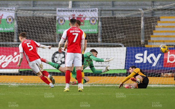 131225 - Newport County v Fleetwood Town, EFL Sky Bet League 2 - Finley Potter of Fleetwood Town heads past Jordan Wright of Newport County to score the opening goal