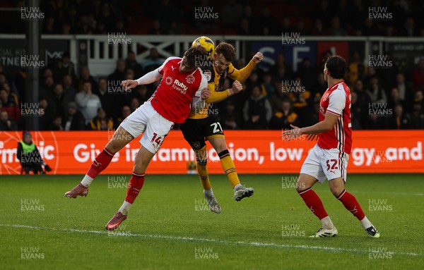131225 - Newport County v Fleetwood Town, EFL Sky Bet League 2 - Michael Spellman of Newport County looks to head at goal as Lewis McCann of Fleetwood Town closes in
