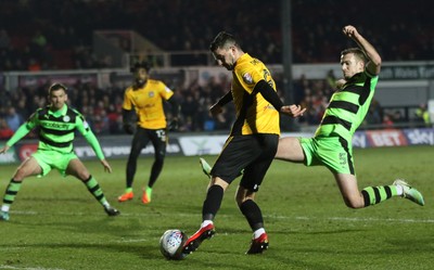 060318 - Newport County v Forest Green Rovers, Sky Bet League 2 - Padraig Amond of Newport County is challenged by Lee Collins of Forest Green Rovers