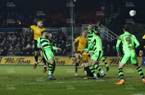 060318 - Newport County v Forest Green Rovers, Sky Bet League 2 - Dan Butler of Newport County heads the ball forward to set up the second goal for Paul Hayes