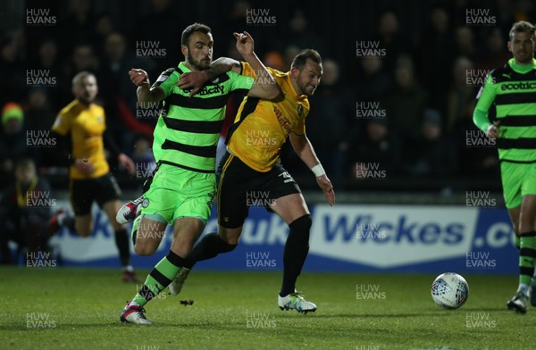 060318 - Newport County v Forest Green Rovers, Sky Bet League 2 - Paul Hayes of Newport County and Farrend Rawson of Forest Green Rovers compete for the ball
