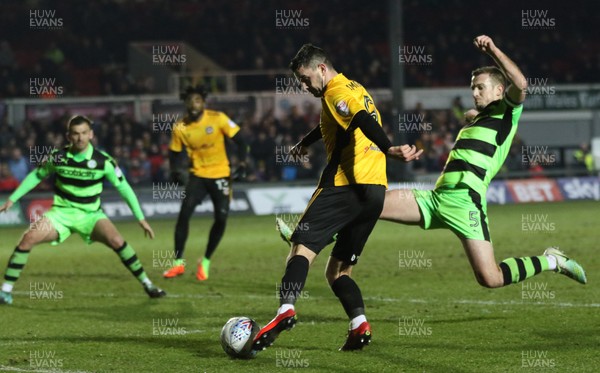060318 - Newport County v Forest Green Rovers, Sky Bet League 2 - Padraig Amond of Newport County is challenged by Lee Collins of Forest Green Rovers