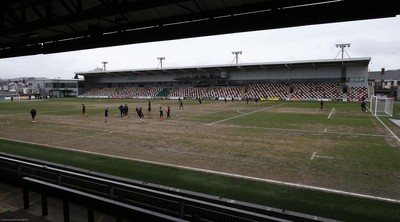 210221 Newport County v Forest Green Rovers, Sky Bet League 2 - Newport County warm up ahead of the match on a very heavy pitch