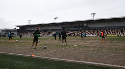 210221 Newport County v Forest Green Rovers, Sky Bet League 2 - Newport County warm up ahead of the match on a very heavy pitch