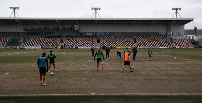 210221 Newport County v Forest Green Rovers, Sky Bet League 2 - Newport County warm up ahead of the match on a very heavy pitch