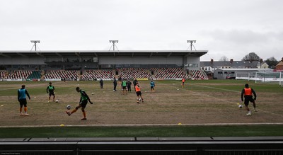 210221 Newport County v Forest Green Rovers, Sky Bet League 2 - Newport County warm up ahead of the match on a very heavy pitch