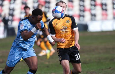 210221 Newport County v Forest Green Rovers, Sky Bet League 2 - Udoka Godwin-Malife of Forest Green Rovers and Jake Scrimshaw of Newport County compete for the ball