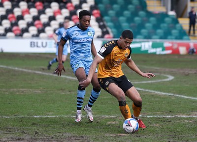 210221 Newport County v Forest Green Rovers, Sky Bet League 2 - Priestley Farquharson of Newport County holds off Ebrima Adams of Forest Green Rovers