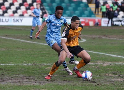210221 Newport County v Forest Green Rovers, Sky Bet League 2 - Priestley Farquharson of Newport County holds off Ebrima Adams of Forest Green Rovers