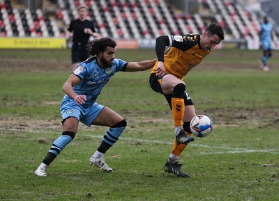 210221 Newport County v Forest Green Rovers, Sky Bet League 2 - Anthony Hartigan of Newport County  holds off Dominic Bernard of Forest Green Rovers