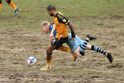 210221 Newport County v Forest Green Rovers, Sky Bet League 2 - Elliott Whitehouse of Forest Green Rovers is brought down by Joss Labadie of Newport County