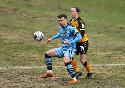 210221 Newport County v Forest Green Rovers, Sky Bet League 2 - Nicholas Cadden of Forest Green Rovers and Aaron Lewis of Newport County compete for the ball