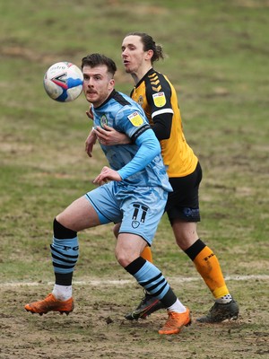 210221 Newport County v Forest Green Rovers, Sky Bet League 2 - Nicholas Cadden of Forest Green Rovers and Aaron Lewis of Newport County compete for the ball