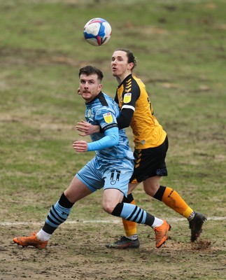 210221 Newport County v Forest Green Rovers, Sky Bet League 2 - Nicholas Cadden of Forest Green Rovers and Aaron Lewis of Newport County compete for the ball