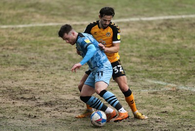 210221 Newport County v Forest Green Rovers, Sky Bet League 2 - Nicholas Cadden of Forest Green Rovers holds off Liam Shephard of Newport County