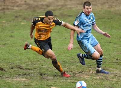 210221 Newport County v Forest Green Rovers, Sky Bet League 2 - Priestley Farquharson of Newport County and Chris Stokes of Forest Green Rovers compete for the ball