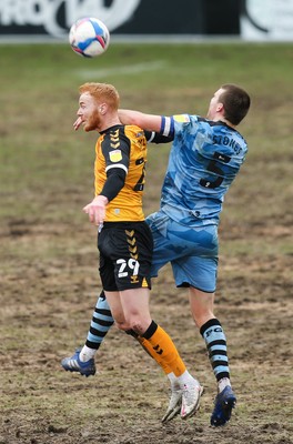 210221 Newport County v Forest Green Rovers, Sky Bet League 2 - Ryan Taylor of Newport County catches Chris Stokes of Forest Green Rovers in the face as compete for the ball