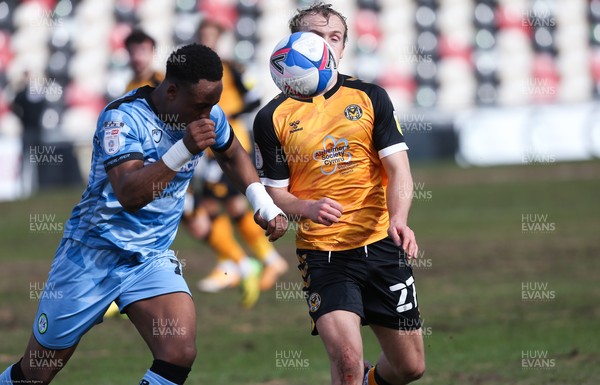 210221 Newport County v Forest Green Rovers, Sky Bet League 2 - Udoka Godwin-Malife of Forest Green Rovers and Jake Scrimshaw of Newport County compete for the ball
