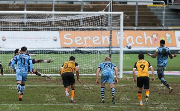210221 Newport County v Forest Green Rovers, Sky Bet League 2 - Jamille Matt of Forest Green Rovers, right, scores the second goal as he puts the penalty shot past Newport County goalkeeper Nick Townsend