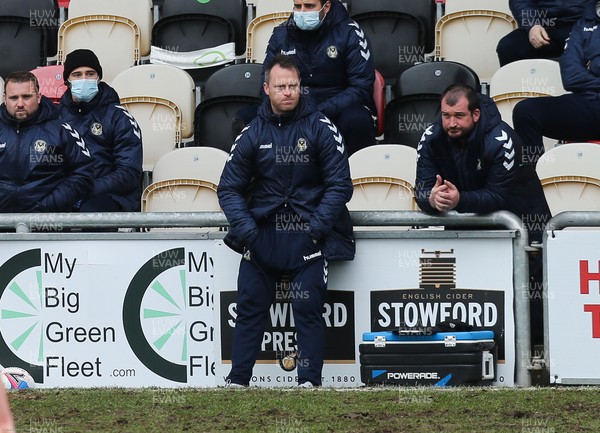 210221 Newport County v Forest Green Rovers, Sky Bet League 2 - Newport County manager Michael Flynn, centre, watches the match