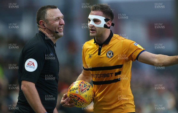 261218 - Newport County v Forest Green Rovers - SkyBet League Two - Mickey Demetriou of Newport County has words with the linesman