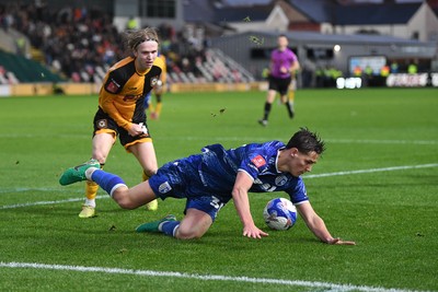 011125 - Newport County v Gillingham - FA Cup First Round - Sam Braybrooke of Newport County is challenged by Max Clark of Gillingham