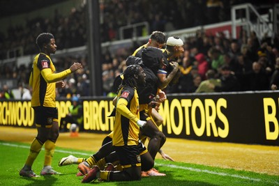 011125 - Newport County v Gillingham - FA Cup First Round - Cameron Antwi of Newport County celebrates scoring a goal with team mates