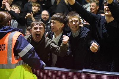 011125 - Newport County v Gillingham - FA Cup First Round - Newport fans celebrate the win