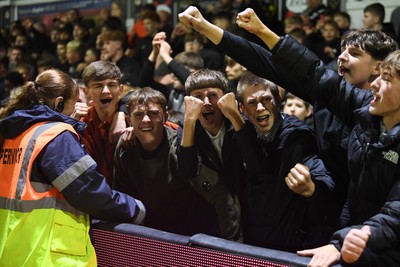 011125 - Newport County v Gillingham - FA Cup First Round - Newport fans celebrate the win