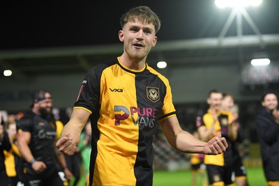 011125 - Newport County v Gillingham - FA Cup First Round - Ben Lloyd of Newport County celebrates after scoring the winning penalty
