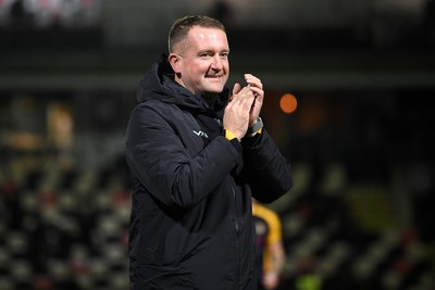 011125 - Newport County v Gillingham - FA Cup First Round - Newport County Goalkeeper Coach, Lee Kendall applauding fans at full time