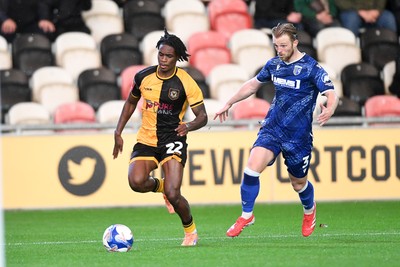 011125 - Newport County v Gillingham - FA Cup First Round - Habeeb Ogunneye of Newport County is challenged by Max Clark of Gillingham