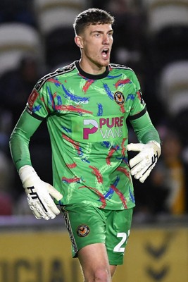 011125 - Newport County v Gillingham - FA Cup First Round - Jordan Wright of Newport County celebrates after he saves a penalty