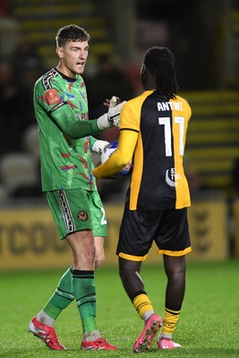 011125 - Newport County v Gillingham - FA Cup First Round - Jordan Wright of Newport County lets Cameron Antwi of Newport County know he can retake his penalty
