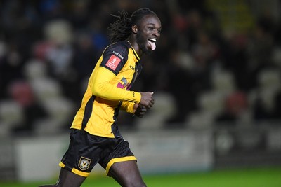 011125 - Newport County v Gillingham - FA Cup First Round - Cameron Antwi of Newport County celebrates after scoring his penalty