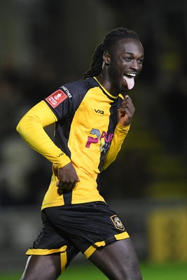 011125 - Newport County v Gillingham - FA Cup First Round - Cameron Antwi of Newport County celebrates after scoring his penalty