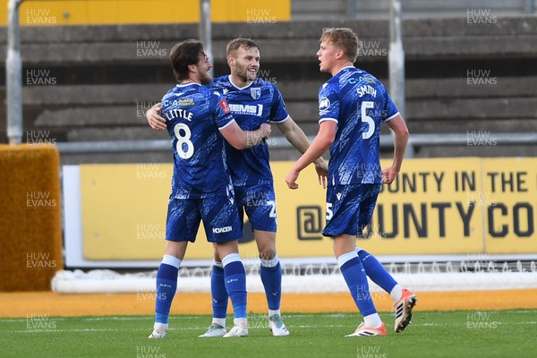 011125 - Newport County v Gillingham - FA Cup First Round - Elliott Nevitt of Gillingham celebrates scoring a goal with team mates