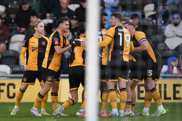 011125 - Newport County v Gillingham - FA Cup First Round - Cameron Evans of Newport County celebrates scoring a goal with team mates