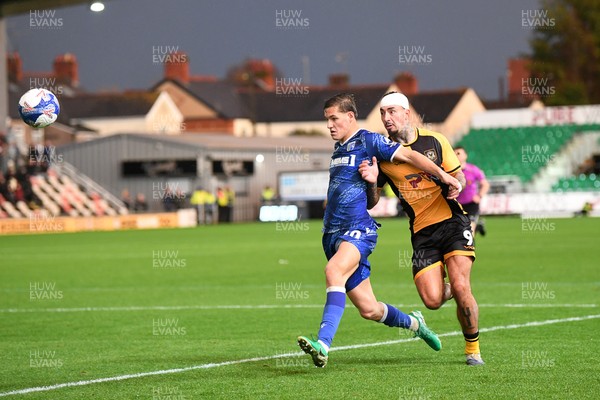 011125 - Newport County v Gillingham - FA Cup First Round - Courtney Baker-Richardson of Newport County is challenged by Elliott Nevitt of Gillingham