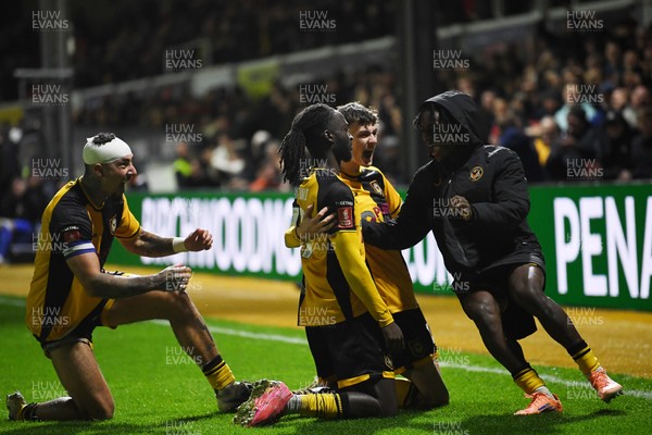 011125 - Newport County v Gillingham - FA Cup First Round - Cameron Antwi of Newport County celebrates scoring a goal with team mates