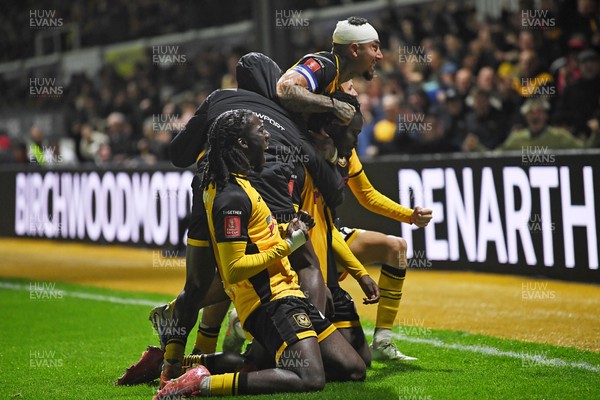 011125 - Newport County v Gillingham - FA Cup First Round - Cameron Antwi of Newport County celebrates scoring a goal with team mates