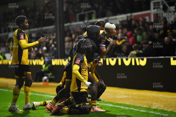 011125 - Newport County v Gillingham - FA Cup First Round - Cameron Antwi of Newport County celebrates scoring a goal with team mates