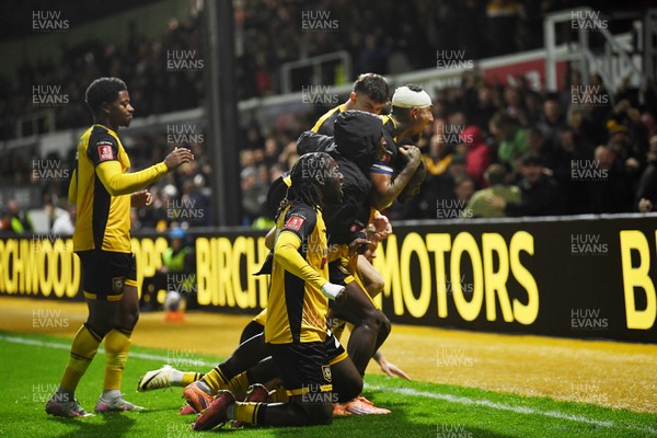 011125 - Newport County v Gillingham - FA Cup First Round - Cameron Antwi of Newport County celebrates scoring a goal with team mates