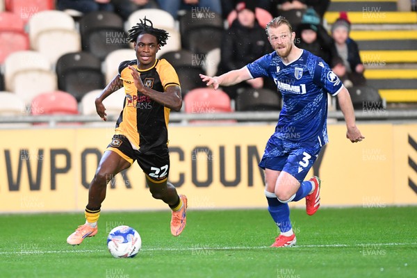 011125 - Newport County v Gillingham - FA Cup First Round - Habeeb Ogunneye of Newport County is challenged by Max Clark of Gillingham