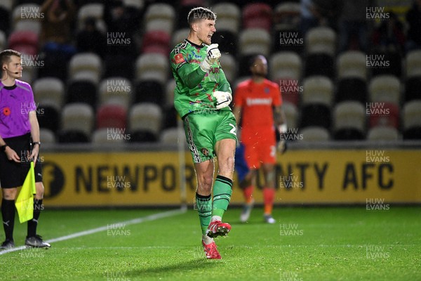 011125 - Newport County v Gillingham - FA Cup First Round - Jordan Wright of Newport County celebrates after he saves a penalty