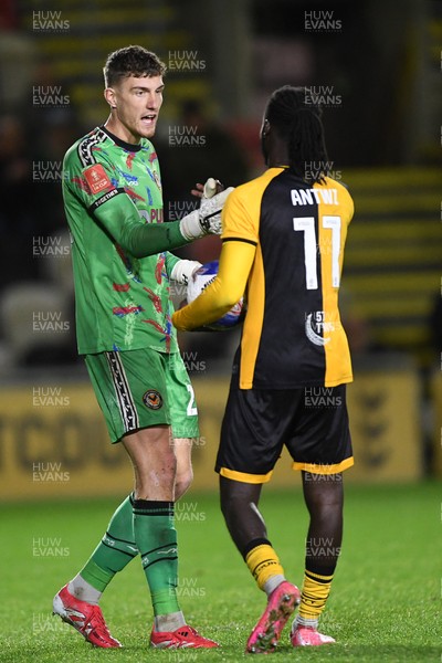 011125 - Newport County v Gillingham - FA Cup First Round - Jordan Wright of Newport County lets Cameron Antwi of Newport County know he can retake his penalty
