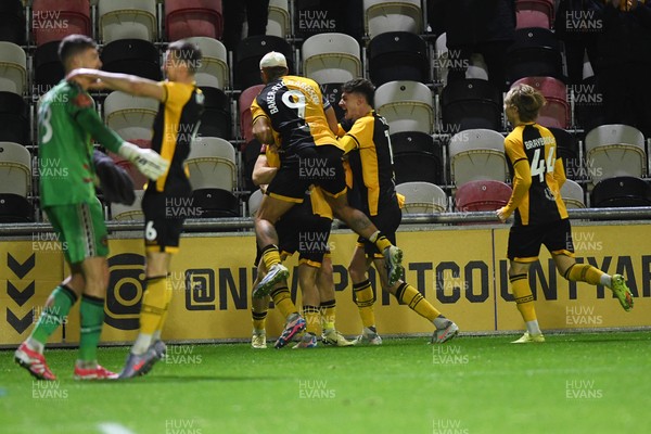011125 - Newport County v Gillingham - FA Cup First Round - Ben Lloyd of Newport County celebrates with team mates after he scores the winning penalty 
